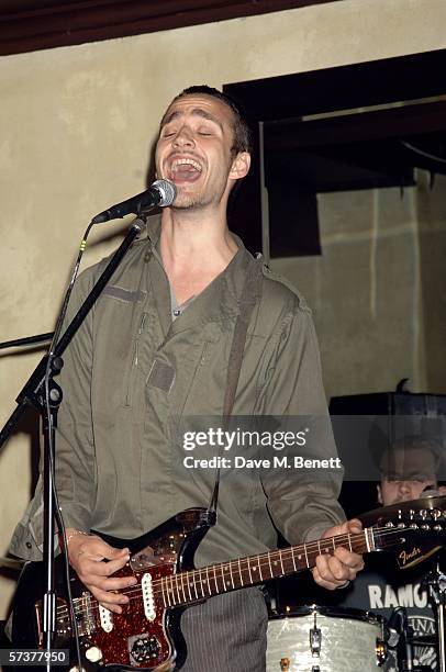 Singer Rasmus Walter Hansen of Grand Avenue performs at the private VIP party thrown by model Helena Christensen in association with Swarovski and...