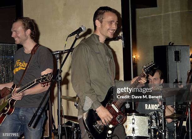 Niels Kristian Baerentzen and Rasmus Walter Hansen of Grand Avenue perform at the private VIP party thrown by model Helena Christensen in association...