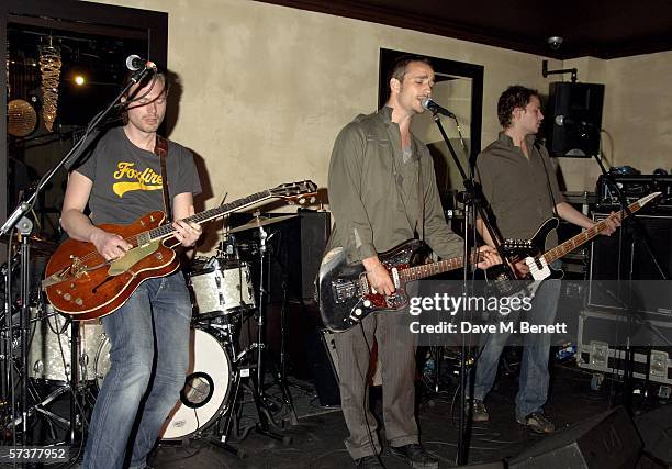 Niels Kristian Baerentzen, Rasmus Walter Hansen and Marc Stebbing of Grand Avenue perform at the private VIP party thrown by model Helena Christensen...