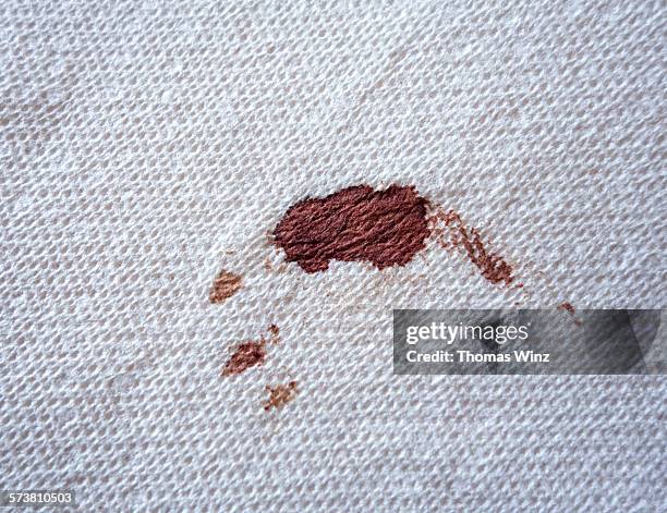 blood stain on a tissue - blood stain stock-fotos und bilder