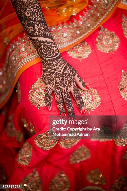 henna on bride's hand - bangladeshi bride stock pictures, royalty-free photos & images