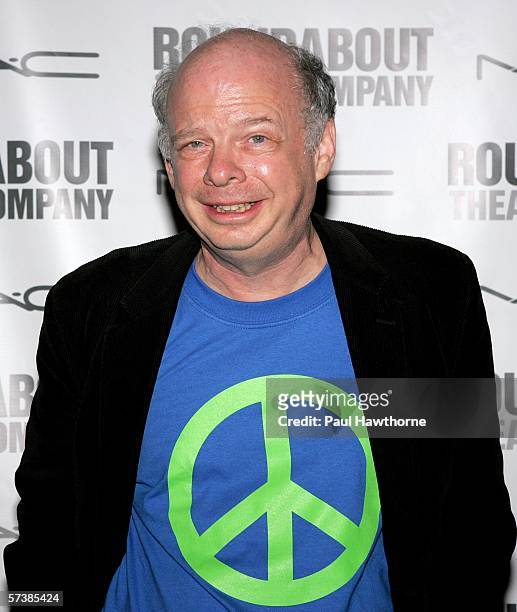 Actor Wallace Shawn poses for photos after the opening night of the Roundabout Theatre Company's Broadway production of "The Threepenny Opera" at...