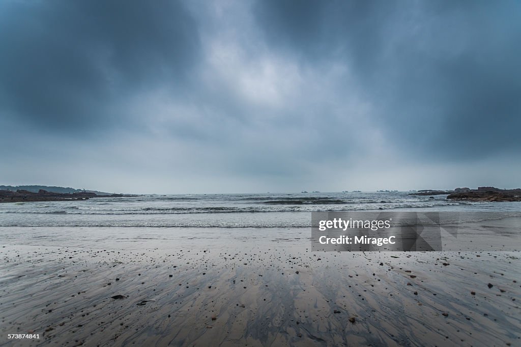 Stormy overcast sky and beach in Qingdao