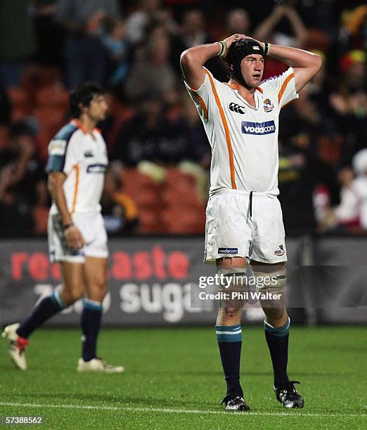 Corniel Van Zyl of the Cheetahs holds his hands to his head following the Round 11 Super 14 match between the Chiefs and the Cheetahs at Waikato...