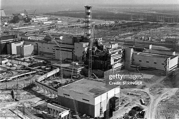 - Picture taken from a helicopter in April 1986 shows a general view of the destroyed 4th power block of Chernobyl's nuclear power plant few days...