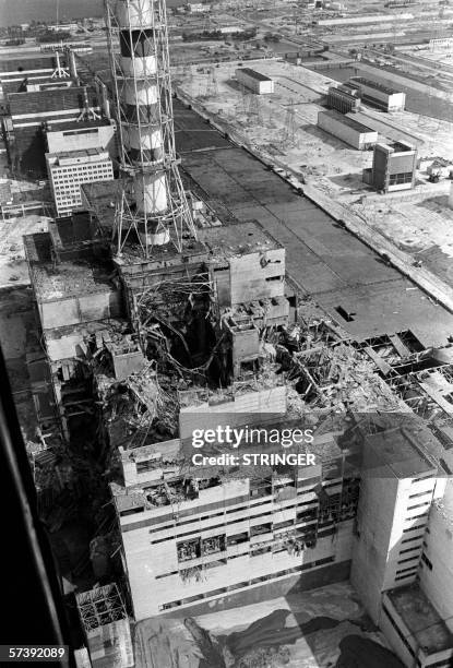 - Picture taken from a helicopter in April 1986 shows a general view of the destroyed 4th power block of Chernobyl's nuclear power plant few days...