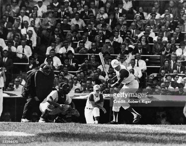 American baseball player Frank Robinson of the Cincinnati Reds at bat in one of the final three games of the World Series against the New York...