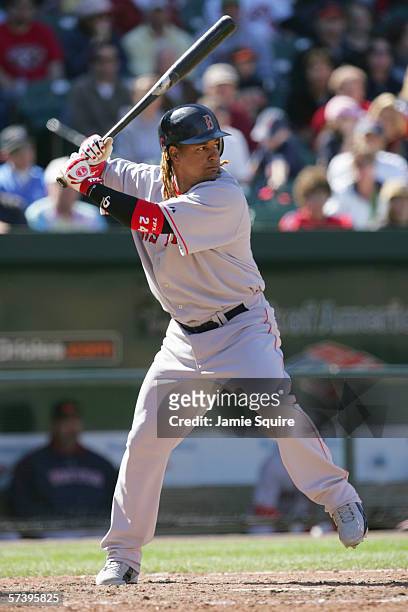 Manny Ramirez of the Boston Red Sox steps into the swing during the game against the Baltimore Orioles on April 9, 2006 at Camden Yards in Baltimore,...