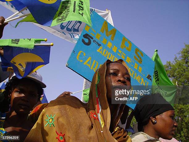 Supporters listen to Chadian President Idriss Deby Itno at a campaign rally of thousands of supporters 21 April 2006 on the Place de l'Independance...