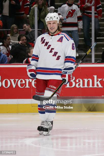 Darius Kasparaitis of the New York Rangers skates against the New Jersey Devils at the Continental Airlines Arena on March 4, 2006 in East...