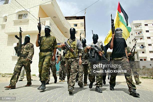 Armed Fatah militants demonstrate, 22 April 2006, in the Rafah refugee camp in the southern Gaza Strip, against Hamas political leader Khaled...