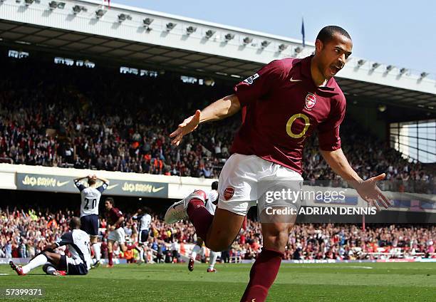 London, UNITED KINGDOM: Arsenal's Thierry Henry reacts after scoring a late goal to equalise against Tottenham Hotspur during the Premiership...