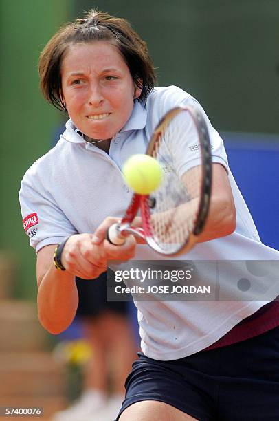 Austria's Yvone Meusburger returns the ball to Spain's Anabel Medina during the second-round of the Fed Cup quarter-finals in Valencia, 22 April...