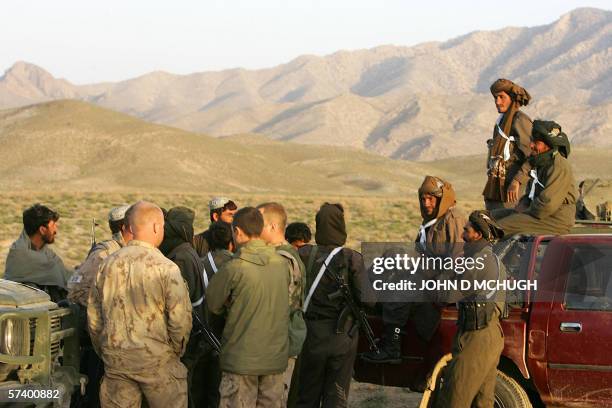 Kandahar, AFGHANISTAN: Members of the Afghan National Police prepare to go on a joint operation with Recon Platoon, 1st Patricia's Canadian Light...