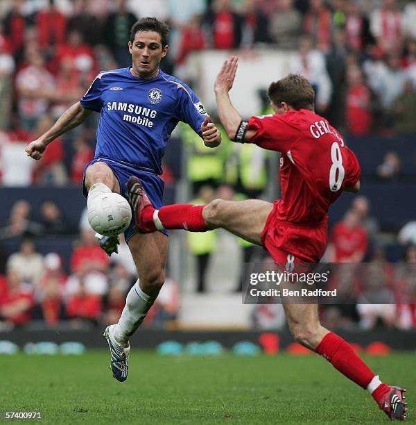 Frank Lampard of Chelsea challenges Steven Gerrard of Liverpool during the FA Cup Semi-Final match between Chelsea and Liverpool at Old Trafford on...