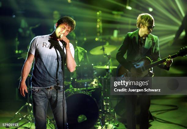 Singer of Norwegian pop trio A-Ha Morten Harket performs beside Pal Waaktaar-Savoy at a dancing competition show on TV station RTL with German...