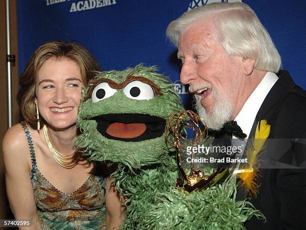 Cheryl Henson, Oscar the Grouch and Caroll Spinney arrives to the press room at the Creative Arts Daytime Emmy Awards at the Marriot Marquis Hotel on...
