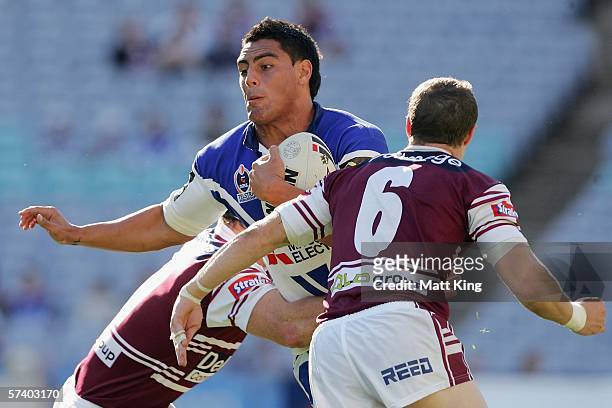 Reni Maitua of the Bulldogs takes on the Sea Eagles defence during the round seven NRL match between the Bulldogs and the Manly-Warringah Sea Eagles...