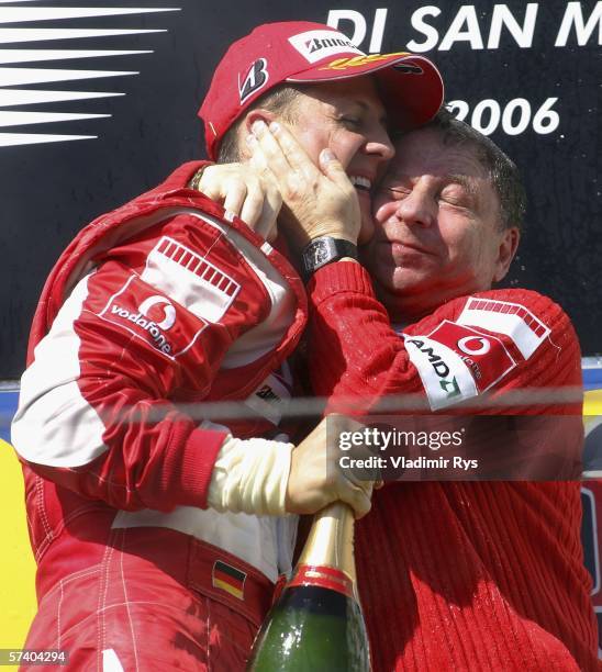 Michael Schumacher of Germany and Ferrari celebrates with team principal Jean Todt after winning the San Marino Formula One Grand Prix at the San...