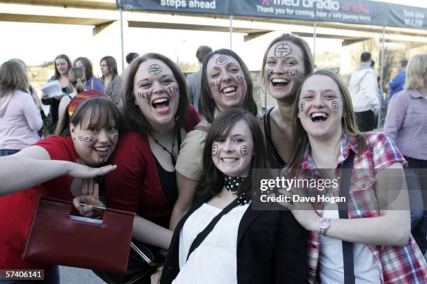 Fans of "Take That" are seen outside the venue for the band's opening night of their 'Ultimate Tour 2006' at Metro Radio Arena on April 23, 2006 in...