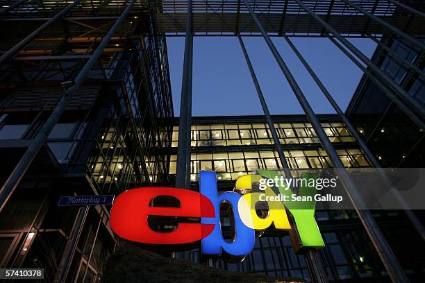 The logo of Internet auction house eBay glows at the company's German headquarters April 24, 2006 in Kleinmachnow, Germany. Germany is among eBay's...