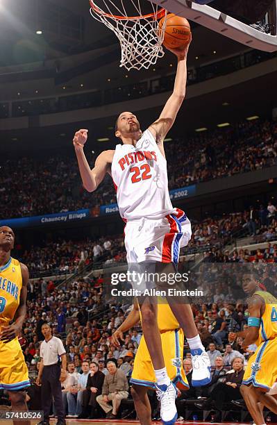 Tayshaun Prince of the Detroit Pistons goes for the dunk against the New Orleans/Oklahoma City Hornets at the Palace of Auburn Hills on April 4, 2006...