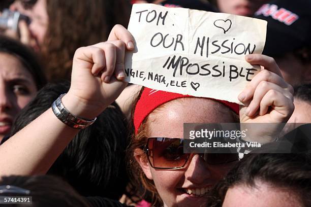 Tom Cruise's fans wait for him to appear on "MTV TRL" at Piazza del Popolo on April 24, 2006 in Rome, Italy.