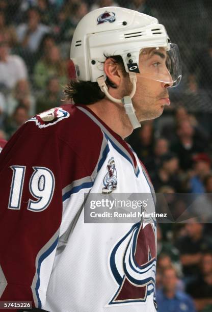 Joe Sakic of the Colorado Avalanche makes a face as he skates in Game two of the NHL Western Conference Quarterfinals against the Dallas Stars at the...