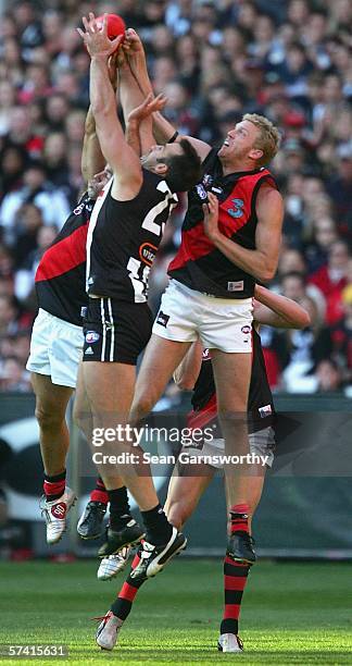 Anthony Rocca for Collingwood and Dustin Fletcher for Essendon in action during the round four AFL match between the Collingwood Magpies and the...
