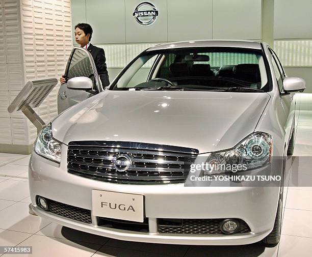 Nissan Fuga is displayed at one of the company's showroom in Tokyo, 25 April 2006. Japan's second-largest automaker reported a sixth straight year of...