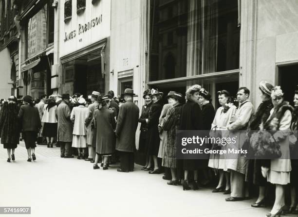 people standing in line at james robinson cinema, ny, (b&w) - 1930 stockfoto's en -beelden