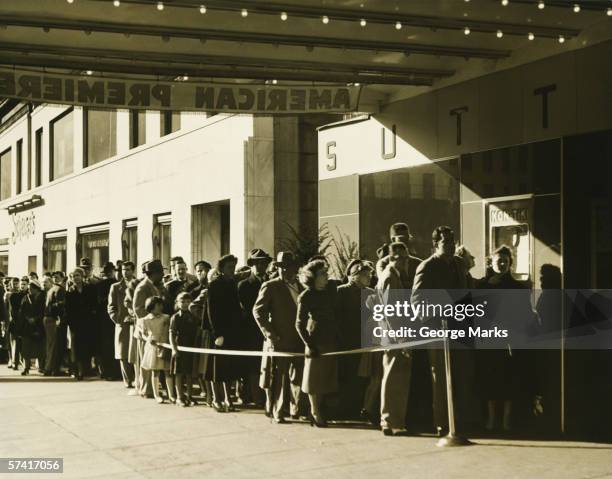 people standing in line at cinema in manhattan, new york city, (b&w) - succession new york premiere stock-fotos und bilder