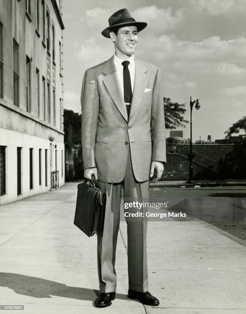 Man In Full Suit Standing On Sidewalk High-Res Stock Photo - Getty Images
