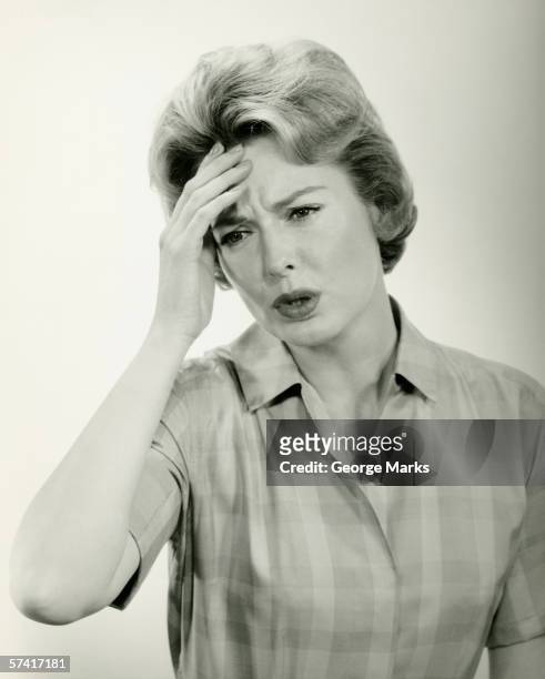 woman  with headache, posing in studio, (b&w) (portrait) - 1930s woman stock pictures, royalty-free photos & images