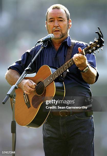 Australian artist John Williamson sings prior to the round four AFL match between the Collingwood Magpies and the Essendon Bombers at the Melbourne...