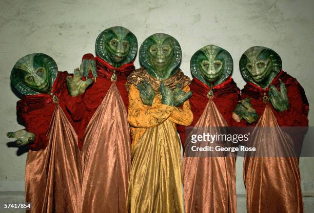 Extras portraying alien creatures on the hit TV show Star Trek-The Next Generation pose during a break in filming on the Hollywood, California,...