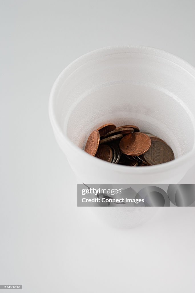 Tips in a plastic cup