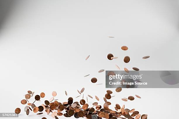 falling coins - cash falling stock pictures, royalty-free photos & images