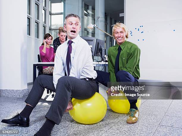 office workers on hoppers - hoppity horse stock pictures, royalty-free photos & images