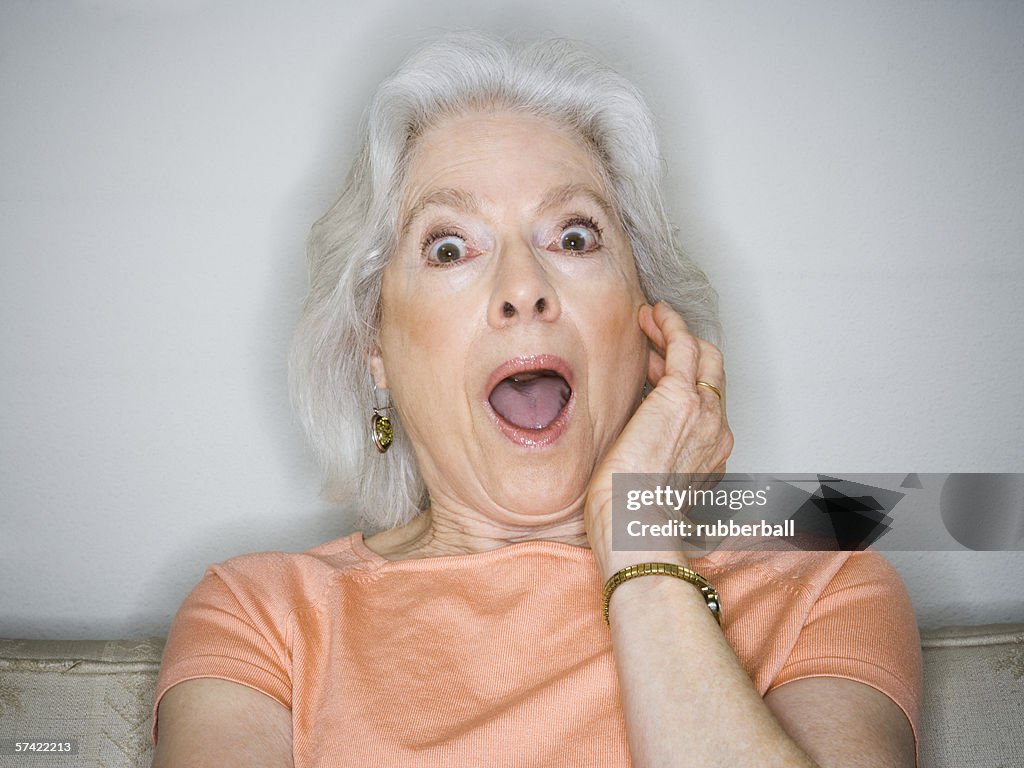 Close-up of a senior woman with her mouth open