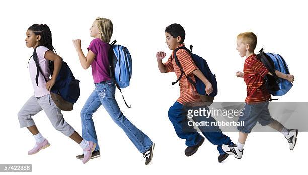 profile of four children running in a row - running side view stock pictures, royalty-free photos & images