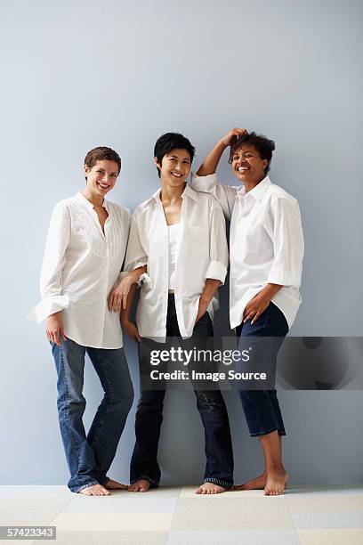 portrait of three women - three people fotografías e imágenes de stock