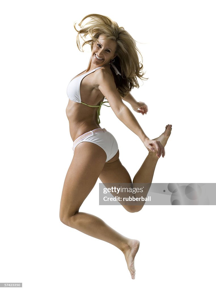 Profile of a woman jumping