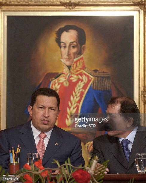 El presidente venezolano Hugo Chavez y el candidato a la presidencia de Nicaragua Daniel Ortega conversan durante la ceremonia de firma de un...