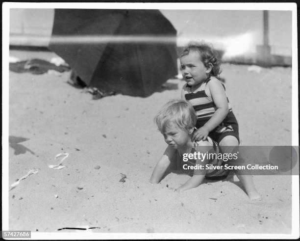 Norma Jeane Baker , future film star Marilyn Monroe , on the beach as a toddler, circa 1929.