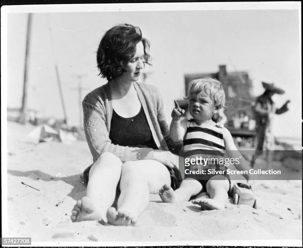 Norma Jeane Baker, future film star Marilyn Monroe , on the beach as a toddler with her mother Gladys Baker, circa 1929.