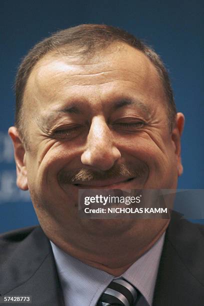 Washington, UNITED STATES: Azerbaijani President Ilham Aliyev smiles during a meeting at the Council on Foreign Relations in Washington 26 April...