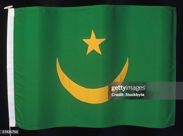 the flag of mauritania - mauritania flag fotografías e imágenes de stock