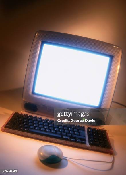 view of a computer with the screen glowing - computer eye level stock pictures, royalty-free photos & images