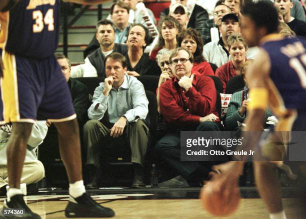 Portland Trail Blazer team owner Paul Allen watches from his courtside seat along with team president and general manager Bob Whitsitt during second...